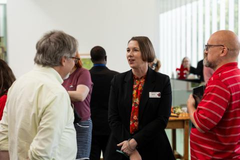 Dr. Yarborough, Dr. Pearce, and Mr. Stelly speak informally at the State of the College