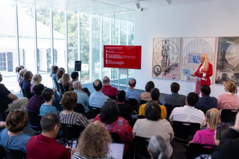 Dean Kokobobo addressees the audience at the State of the College