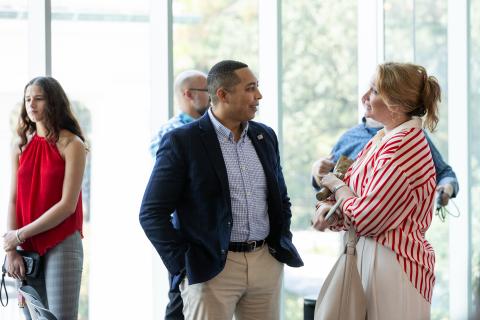 Advisory Board members talk informally at the State of the College